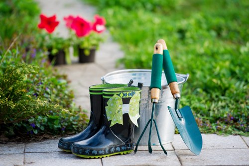 Garden maintenance professional completing a site risk assessment